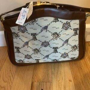 Brown patriotic purse, medium size. Unsure of brand